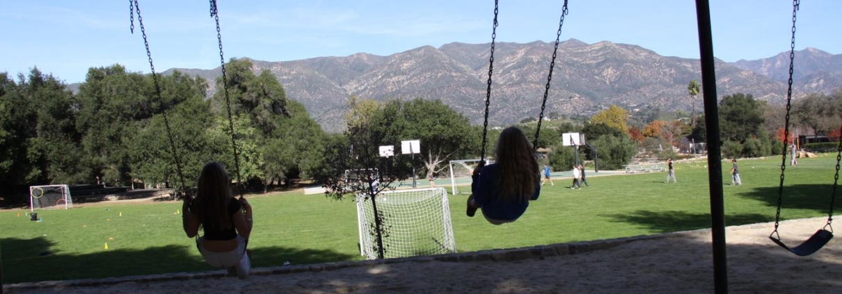 Students on swing set