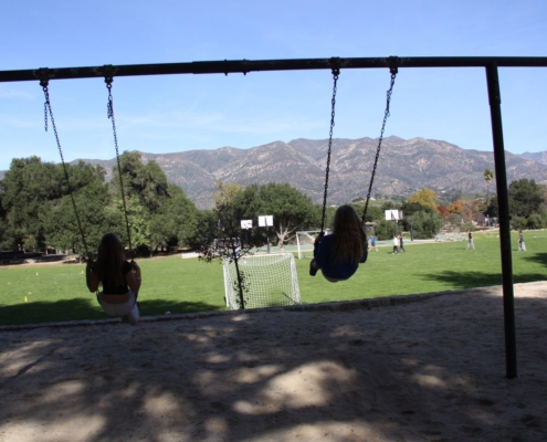 Students on swing set