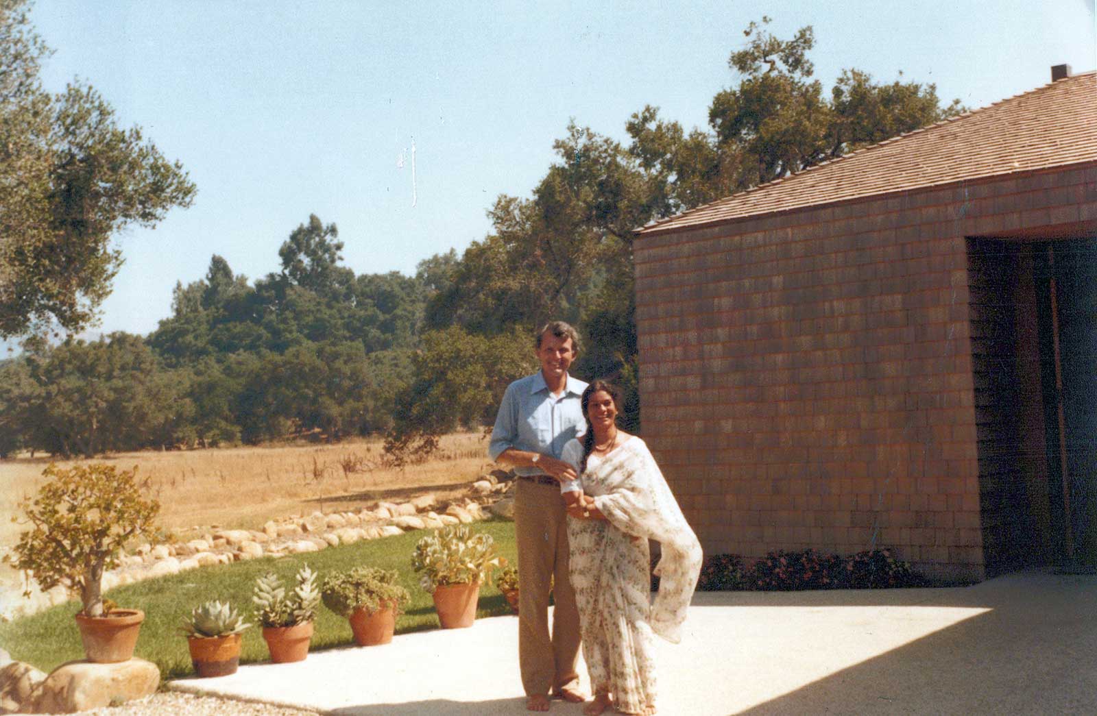 Mark Lee and Asha outside Main House